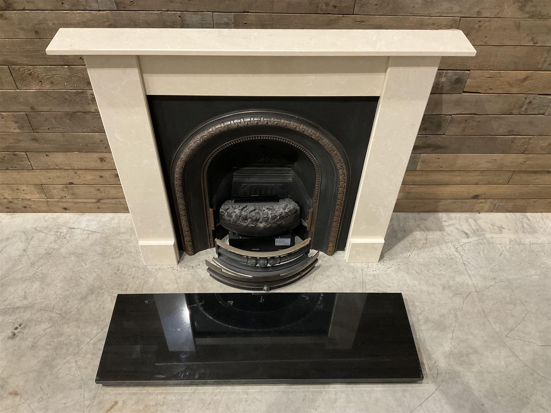 Aurora Dorchester Black Fire suite - granite style surround with cast iron insert, electric fire with remote and black hearth