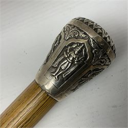 Malacca walking cane, with domed Burmese silver pommel embossed with deities, L91.5cm