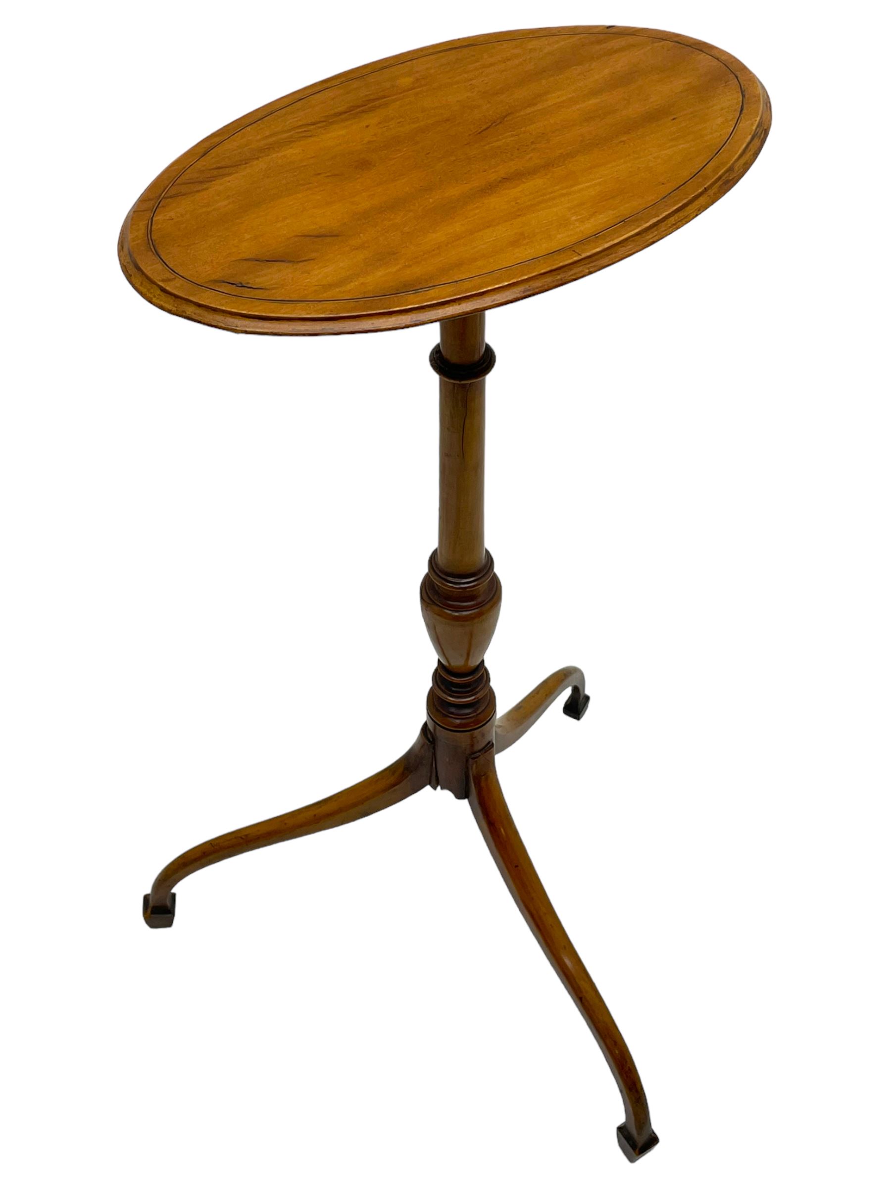 19th century satinwood tripod wine table, moulded oval top inlaid with boxwood and ebony stringing, fine turned vasiform column, three splayed supports with spade feet