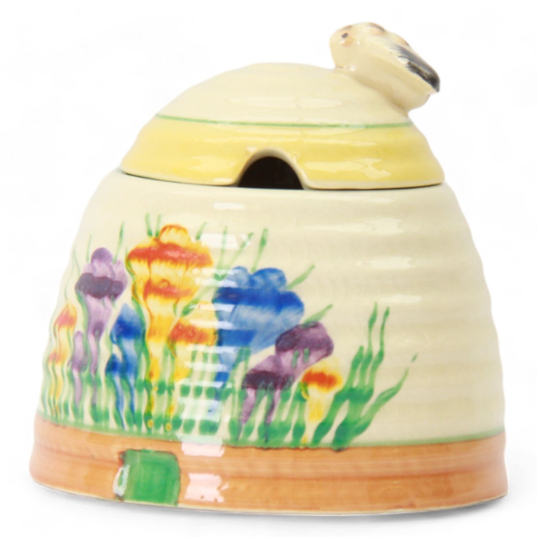 Clarice Cliff Bizarre for Newport Pottery, beehive honey pot with cover in Crocus pattern, with printed mark beneath, H9cm