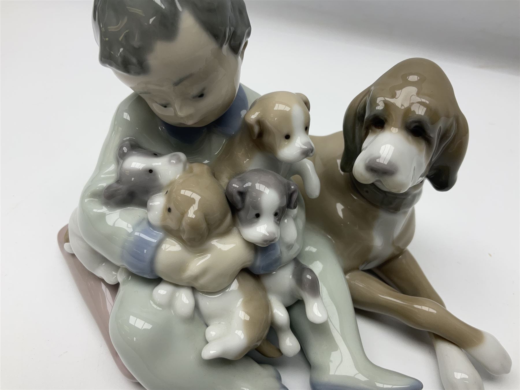 Pair of Lladro figures comprising 'Mis Amigos' model no 5456, and 'Bashful Bather' model no 5455, both with boxes