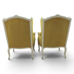 Pair of Louis the XV design white painted armchairs, upholstered in gold fabric with beige floral tapestry back and cushions