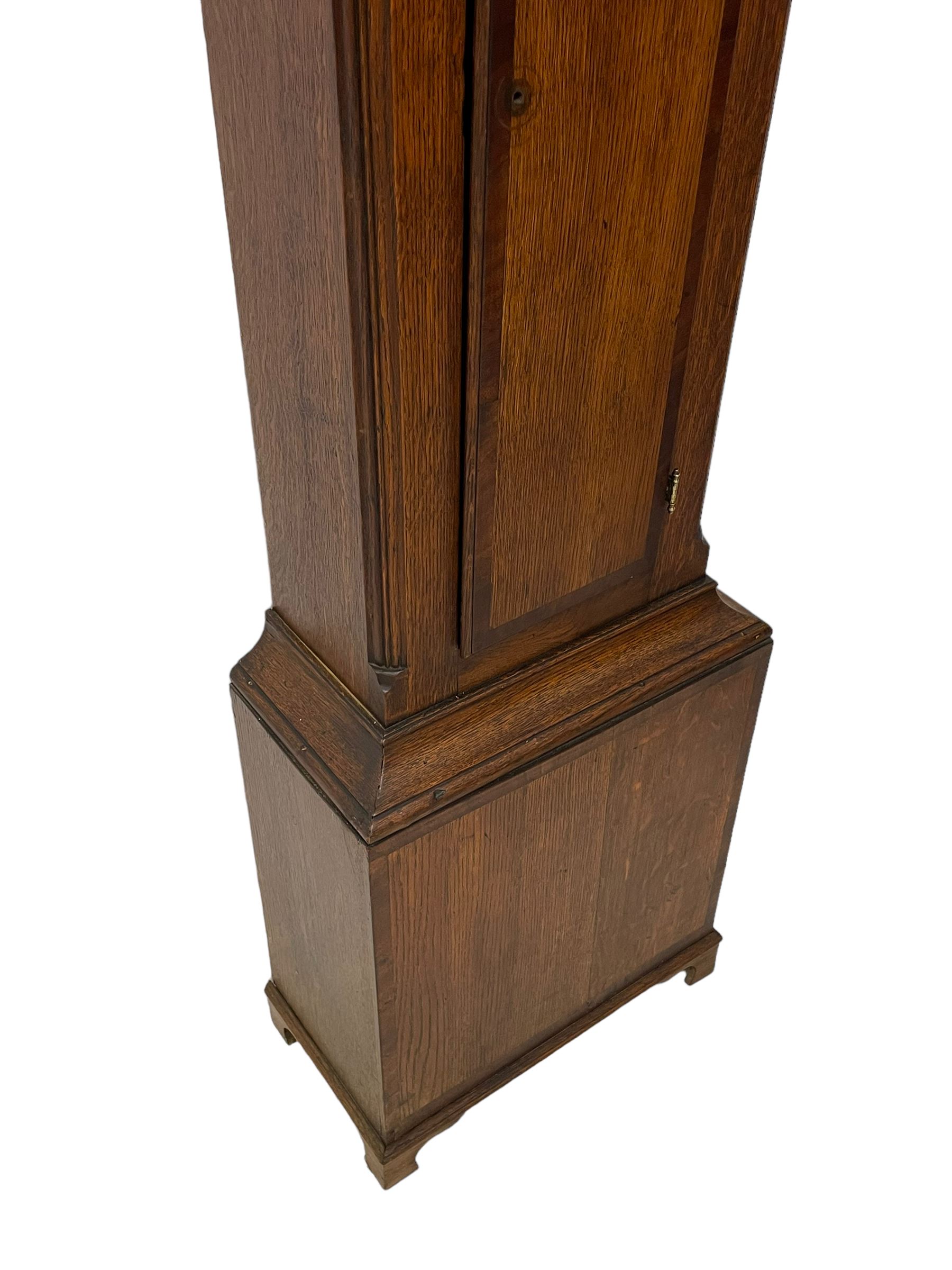 John Greaves of Newcastle - Mid-18th century 8-day oak longcase clock with a flat top, double cornice and break arch hood door flanked by two turned pilasters, trunk with canted corners and a spire topped door with crossbanding, rectangular plinth raised on bracket feet, brass dial with cast spandrels and penny-moon dial and pointer to the arch, matted dial centre with a silvered chapter ring and seconds ring, chapter with Roman numerals, five minute Arabic's, minute and quarter tracks, square date aperture and fettled steel hands, dial pinned to a rack striking movement with a recoil anchor escapement. With pendulum and weights.
