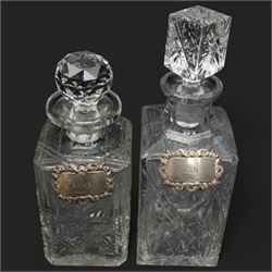 Six crystal decanters, four with silver labels and one with silver plated mount, and one etched glass dinner bell, tallest H30cm 