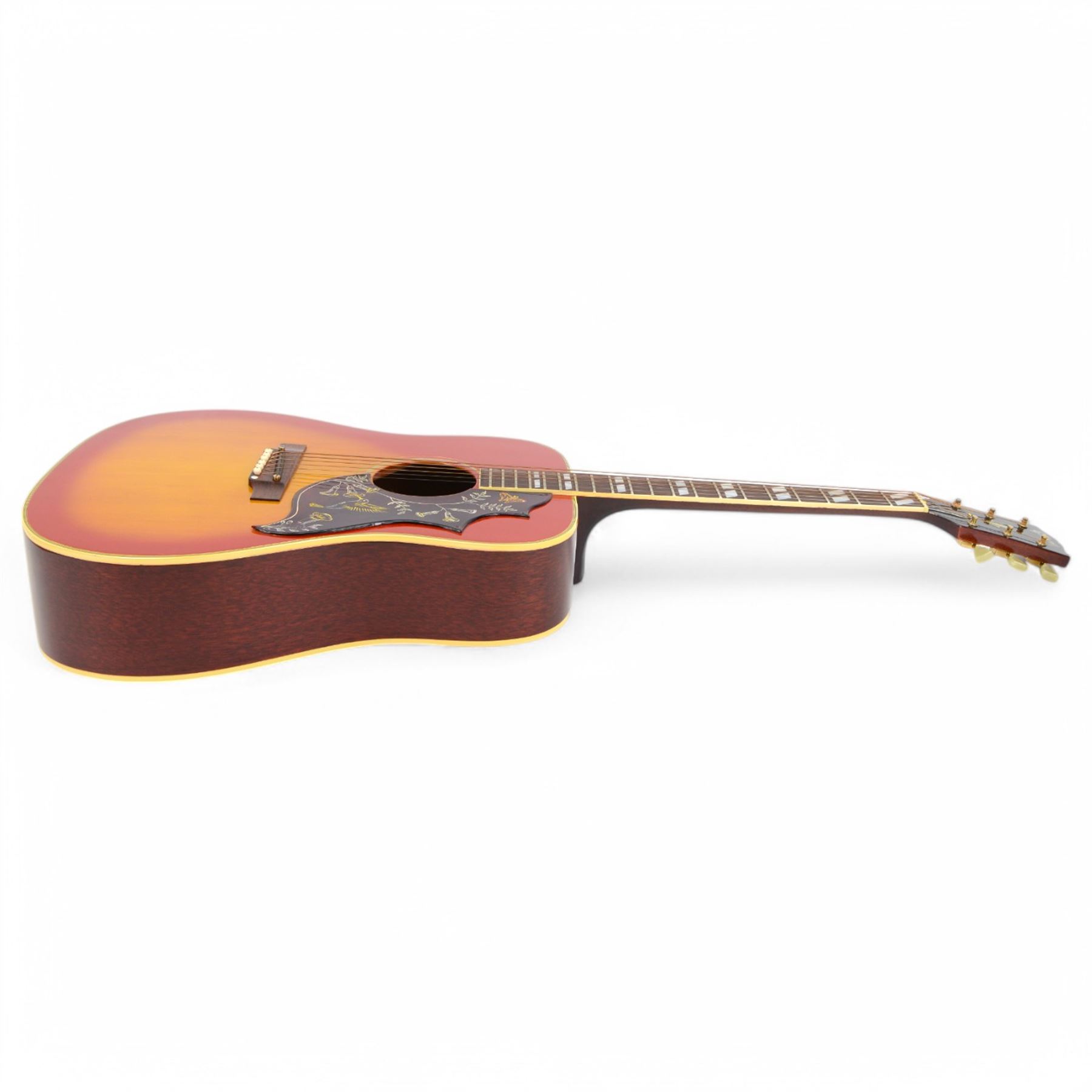 1968 Gibson Hummingbird acoustic guitar, with sunburst finish, serial no. 500460, inlaid mother of pearl fret markers, inlaid pick guard, bound fingerboard and sides, original adjustable bridge, original tuning pegs, contained within hard case, guitar length 104cm