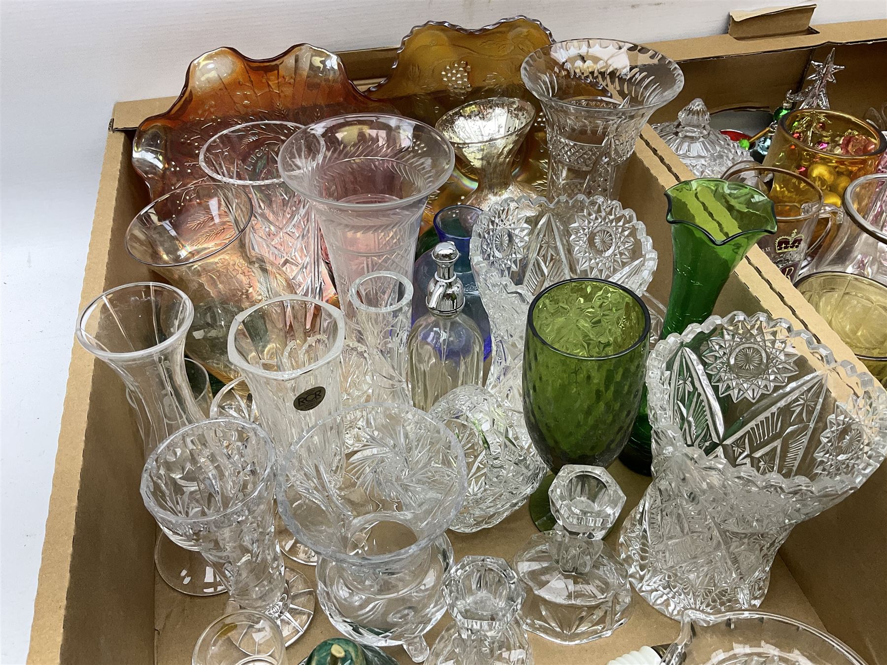 Large collection of glassware to include carnival glass, art glass paperweight, coloured glass, uranium glass, together with three covered steines, ceramic decanters etc, in four boxes 