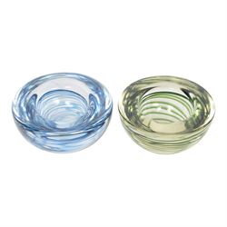 Three Kosta Boda glass bowls, together with four paperweights including an example by Marian Pyrcak