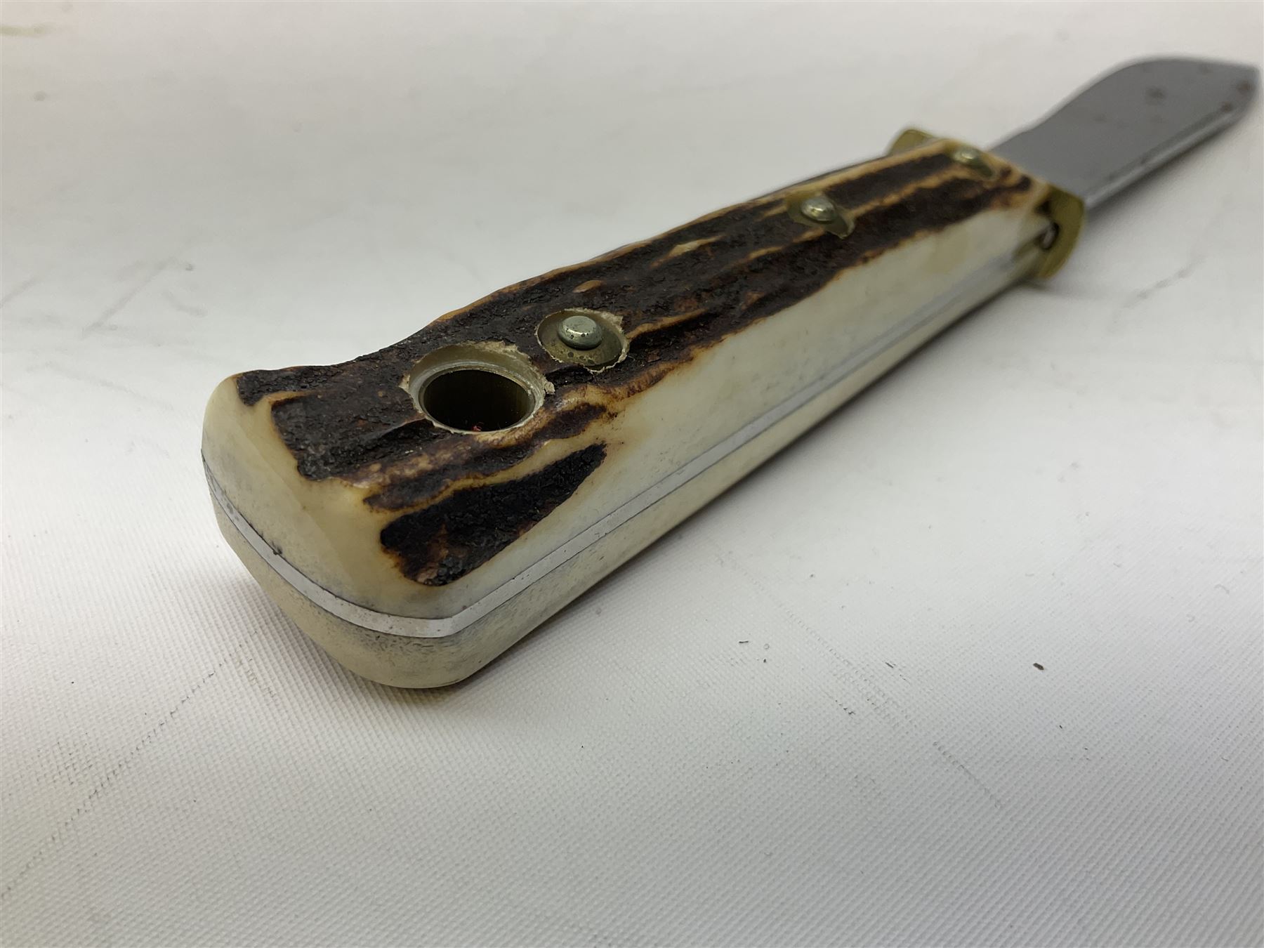 German Puma Hunter's-Pal knife, the 10cm steel blade marked model 6397, serial No.72573 to guard, fixed blade, antler scales; in original hard plastic case with paperwork and guarantee label; with brown leather sheath marked Puma L22.5cm overall