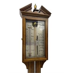 Comitti-20th century mercury stick barometer in an 18th century style mahogany case with satinwood stringing, with a broken pediment, brass finial and round base, silvered register with recording vernier, weather predictions and a centigrade/Fahrenheit spirit thermometer enclosed within a glazed door, visible tube with a bulb cistern and turned mahogany cover.
Mercury clean and present with no air locks.