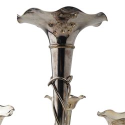 Silver plated seven branch epergne with trumpet shape vases with scroll leaf branches H36cm