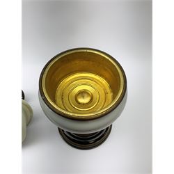 A Victorian oil lamp, with opaque glass reservoir hand painted with flowers beneath a Hinks burner and supporting a globular floral painted opaque glass shade and glass chimney, H47.5cm. 