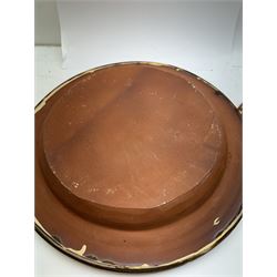 John Hudson: Large slipware charger in the style of Thomas Toft by John Hudson of Mirfield Pottery, decorated with the lion supporter taken by Toft from the Royal Arms, incised marks verso, D 44cm.
