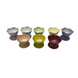 Mixed set of lustre fruit dishes, naturalistically moulded, with printed marks beneath, three Beswick, five Maling