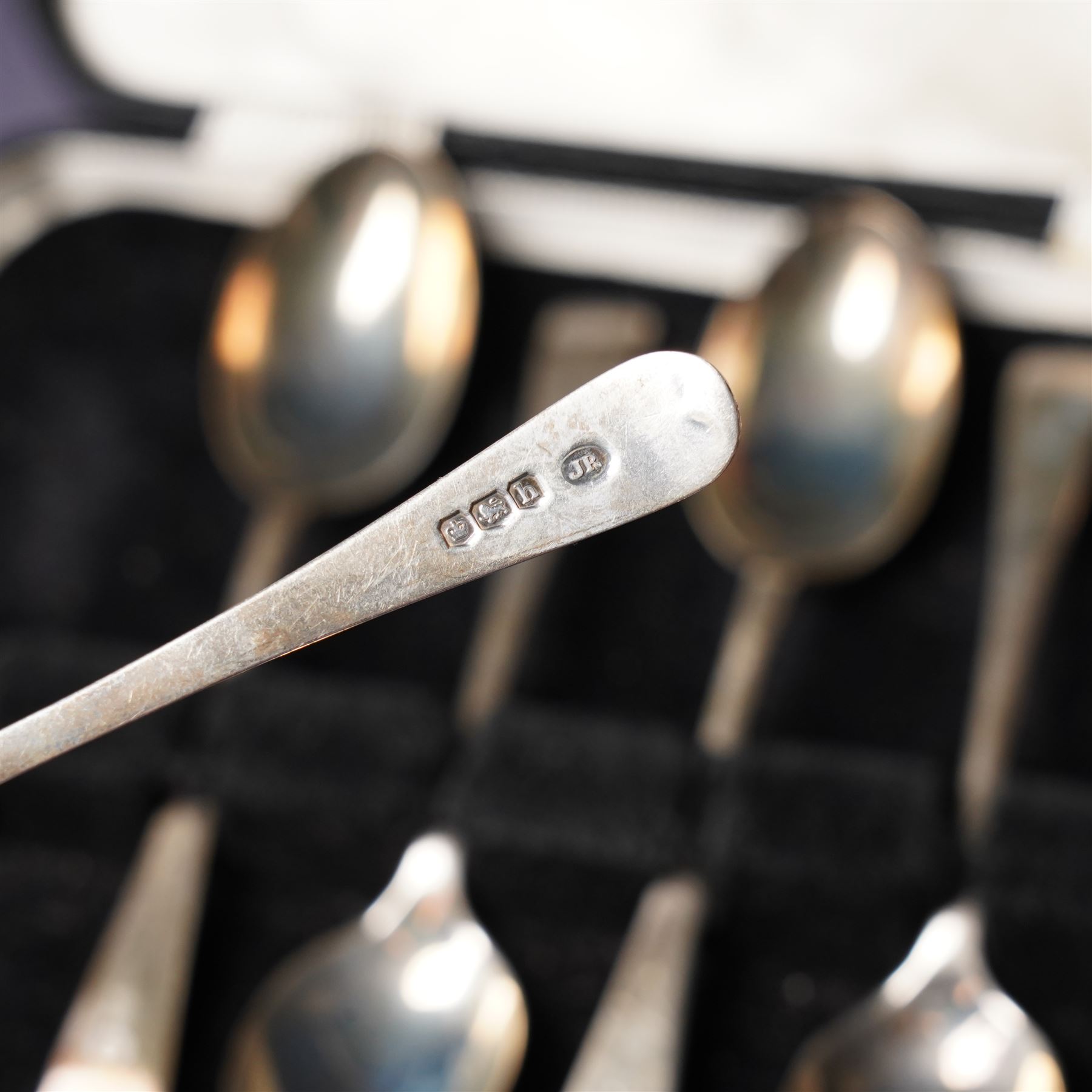 Set of six silver coffee spoons with examples of various British hallmarks , boxed, a set of six silver coffee spoons Sheffield 1925 Maker John Round & Son Ltd and six silver handled pastry knives