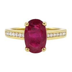 18ct gold oval ruby ring, with round brilliant cut diamond shoulders, hallmarked, ruby approx 2.35 carat
