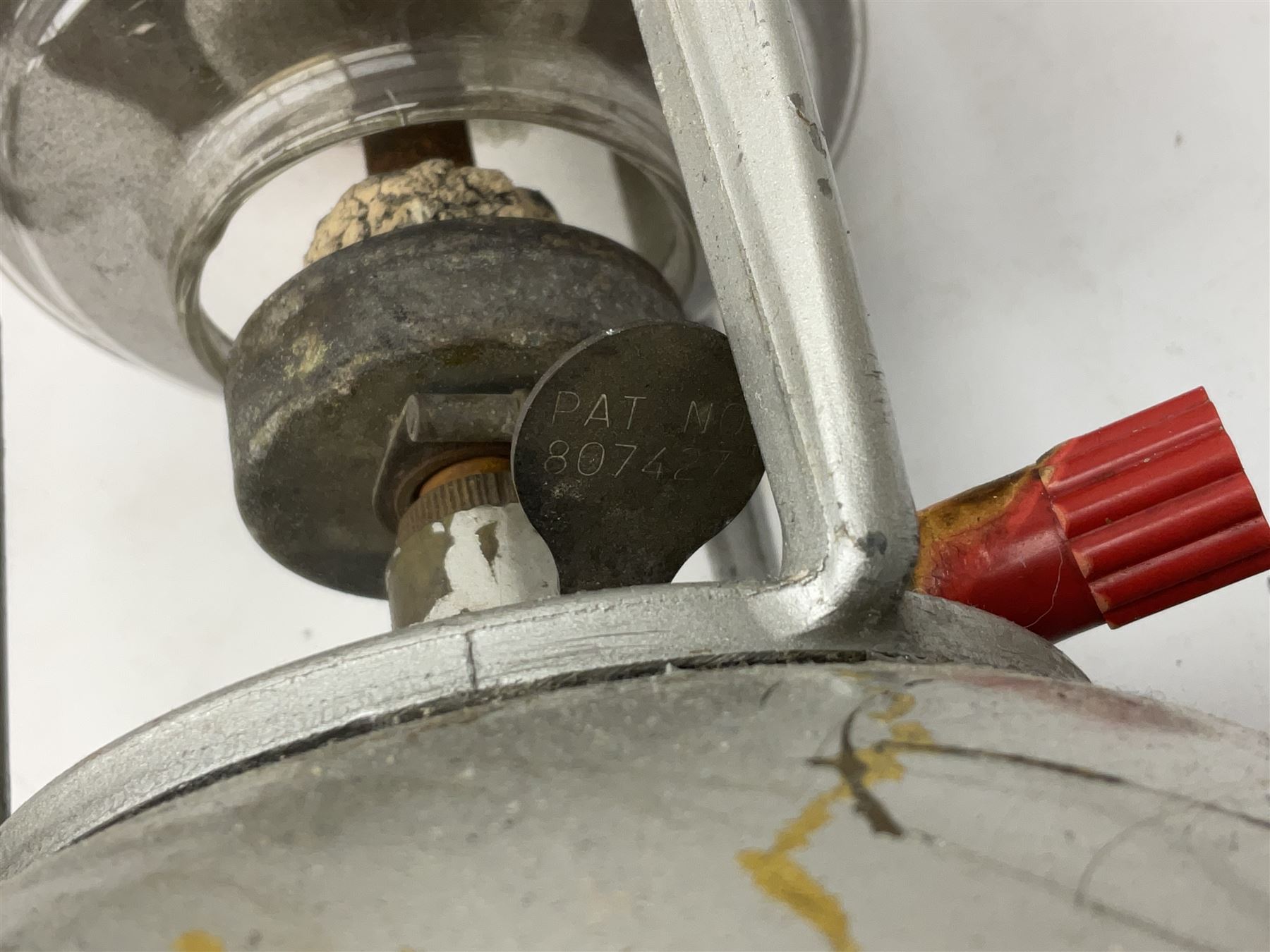 Copper and brass ship’s lamp marked ‘Anchor’, H25cm, Feuer hand storm lantern, Bialaddin Model 315 paraffin lamp and an Anchor lamp (4)