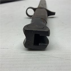 British Pattern 1888 knife bayonet, the 30.5cm double edged blade with raised central medial ridge; in leather covered scabbard L40.5cm overall