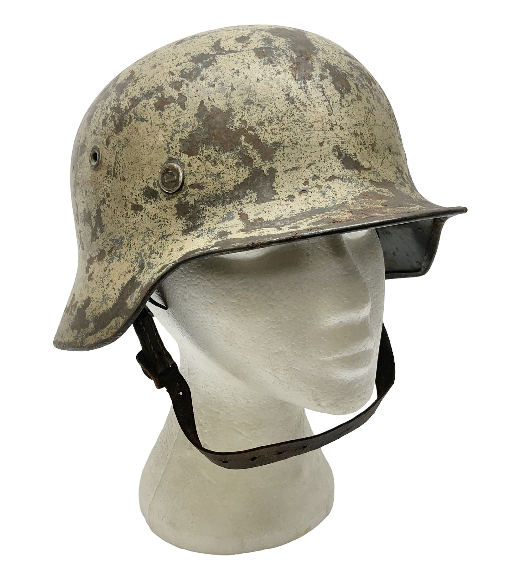 WW2 German Infantry M40 steel helmet with tropical finish and traces of single decal; with chin strap and leather liner marked 57 twice in red; back apron stamped 11 38
