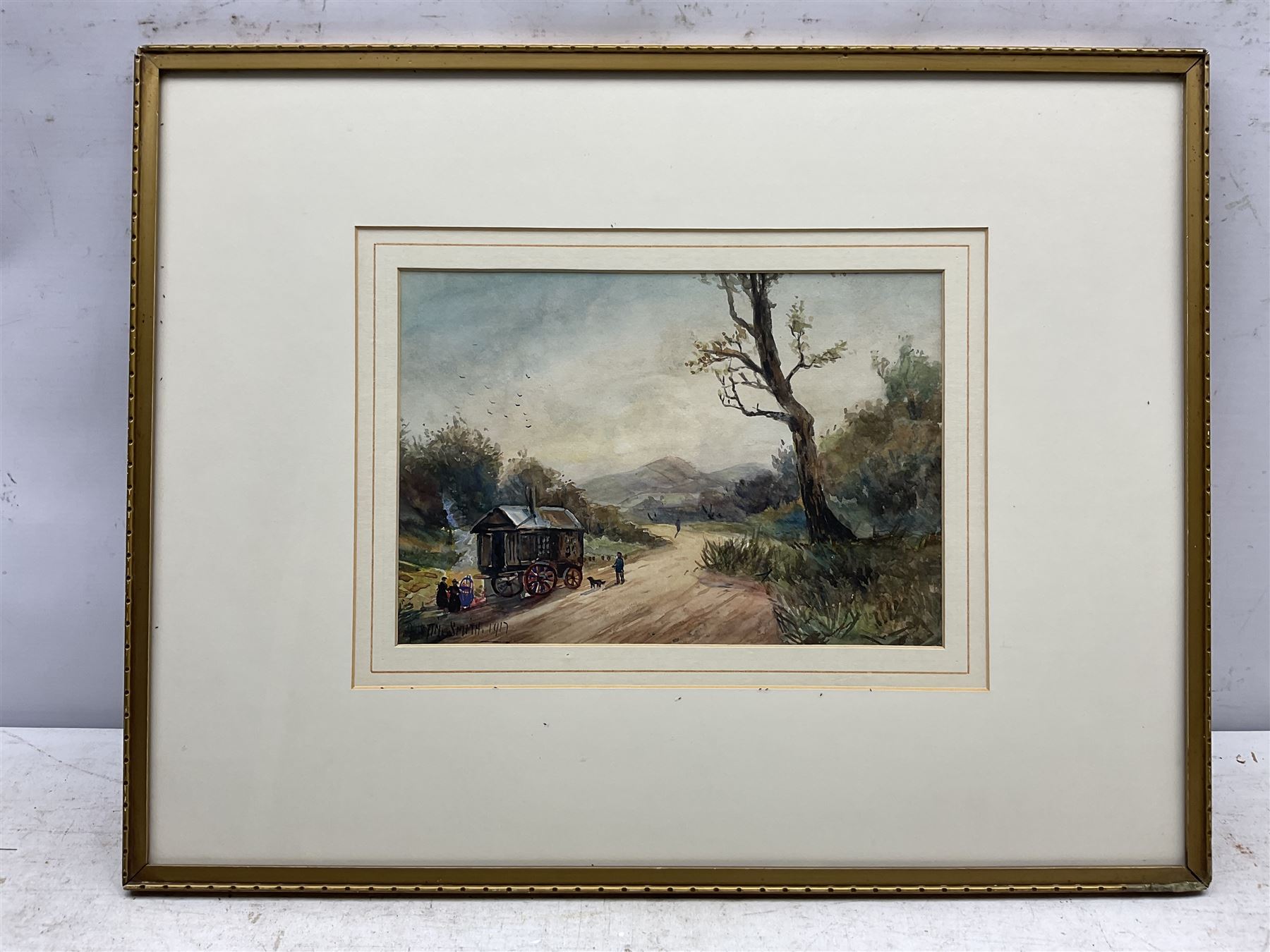 Austin Smith (British early 20th century): Gypsies on the Road, watercolour signed and dated 1917, 18cm x 26cm
