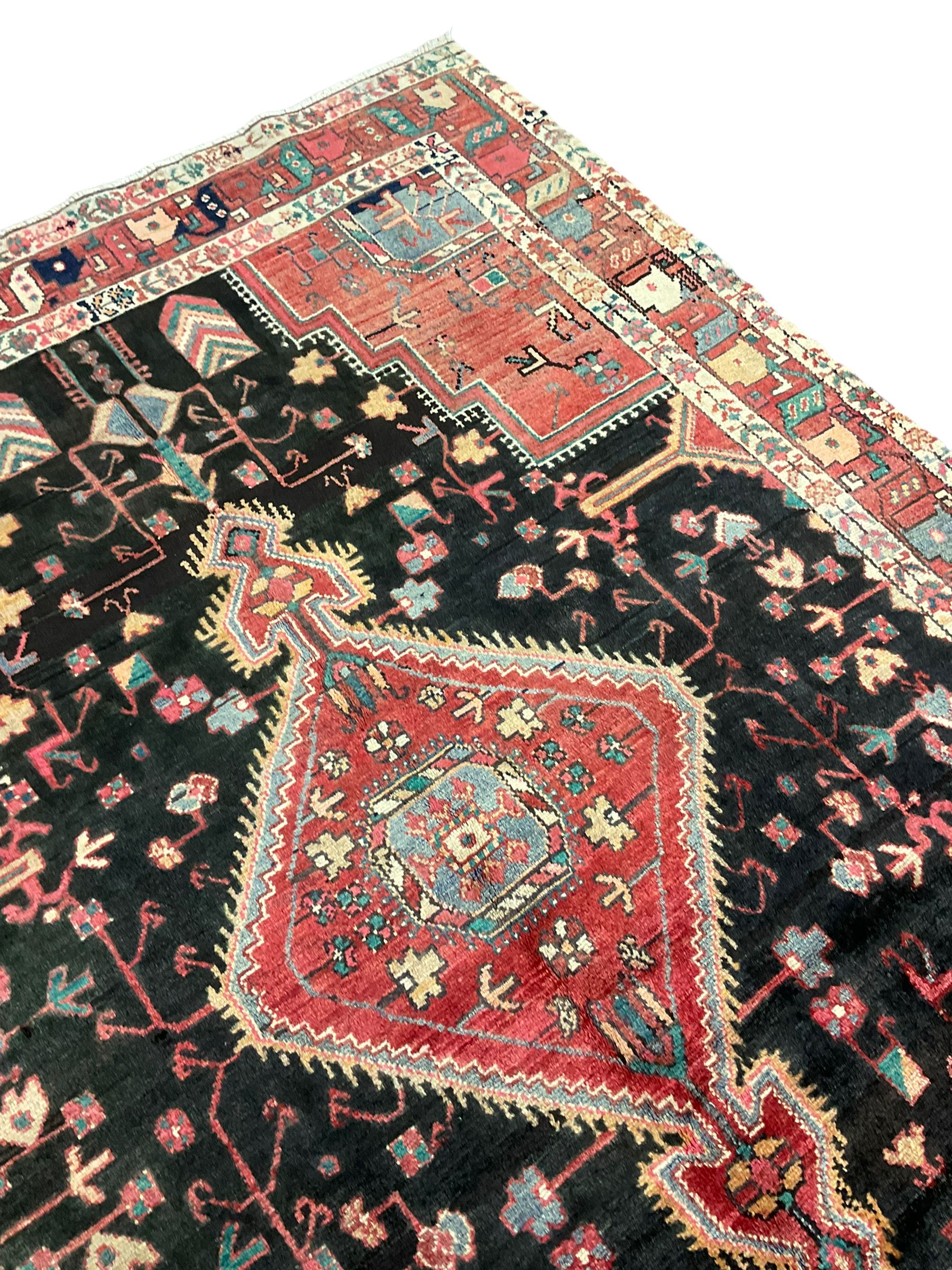 Persian Hamadan rug, the field decorated allover with stylised plant