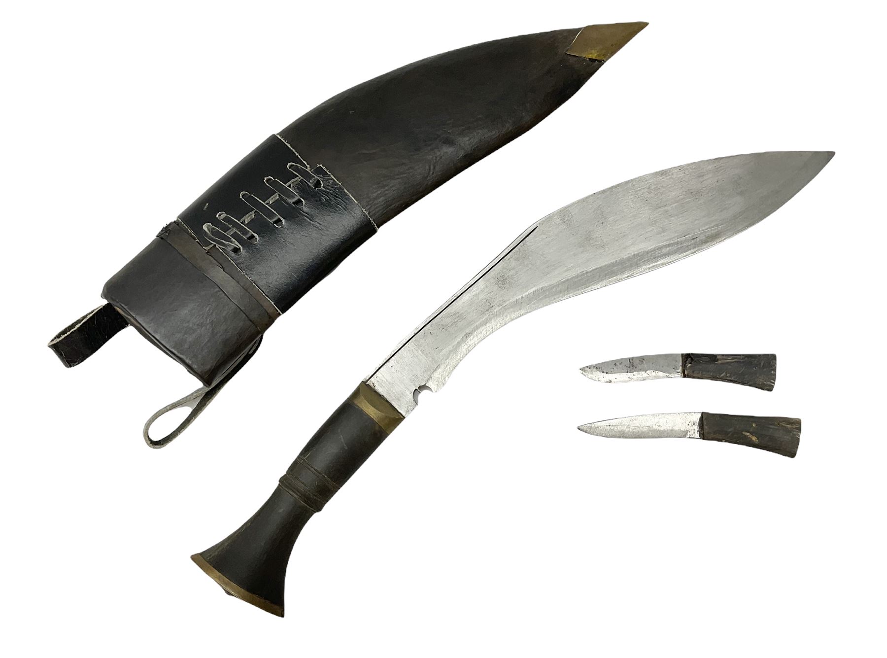 Post WW2 Gurkha kukri, in leather scabbard complete with two skinning knives, 42cm overall