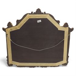 Late 20th century giltwood and composition over mantel mirror, with shaped and scrolled cresting centred by a shell cartouche, with foliate moulded shoulders and lower rail framing a rectangular plate