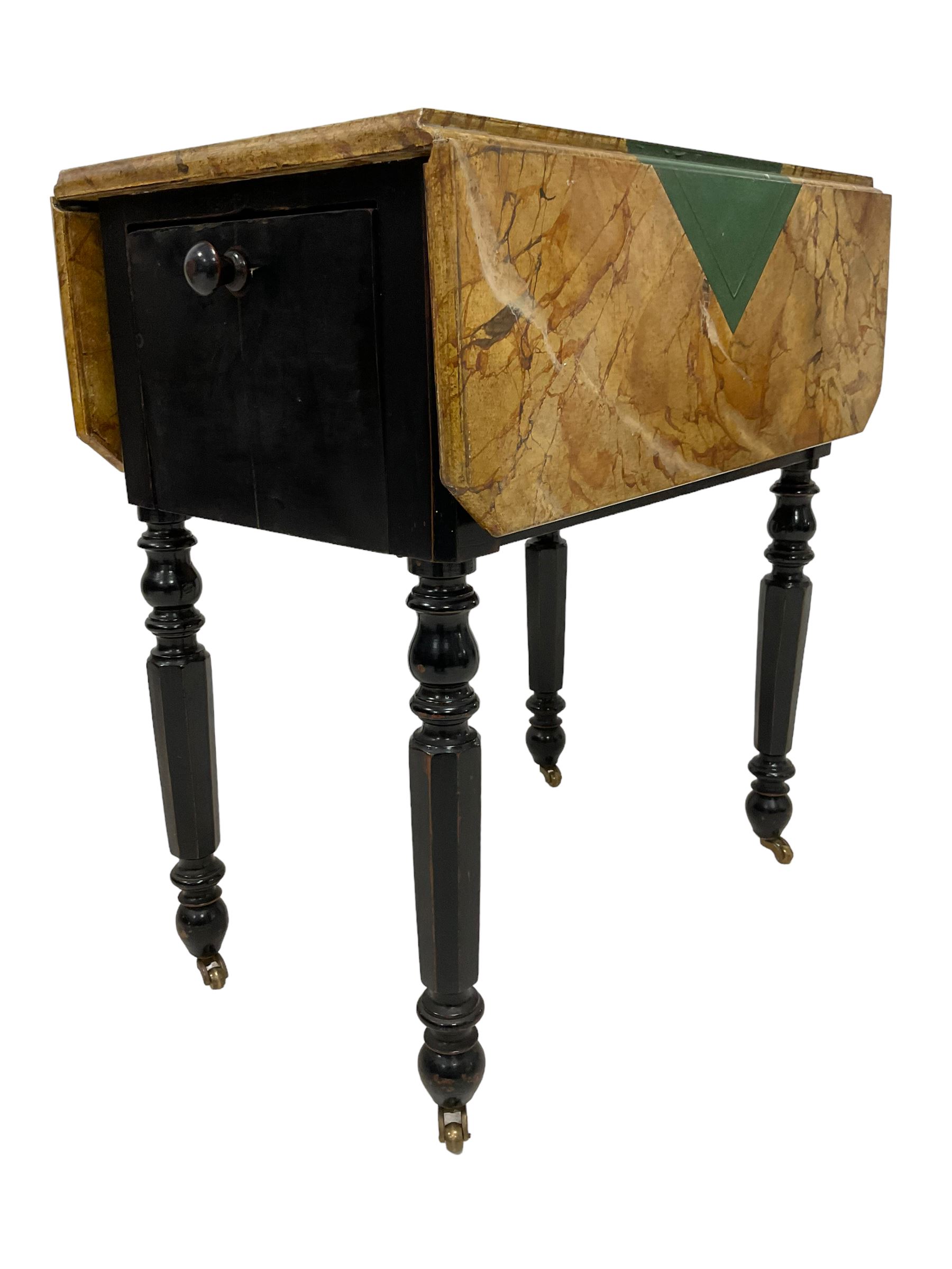 Victorian ebonised drop-leaf pot cupboard with later trompe l'oeil painted top, depicting marbled surface with baize cloth, playing cards and pencil, fitted with two drawers to one end and cupboard to the other with marble inset, on turned and faceted supports with brass castors
