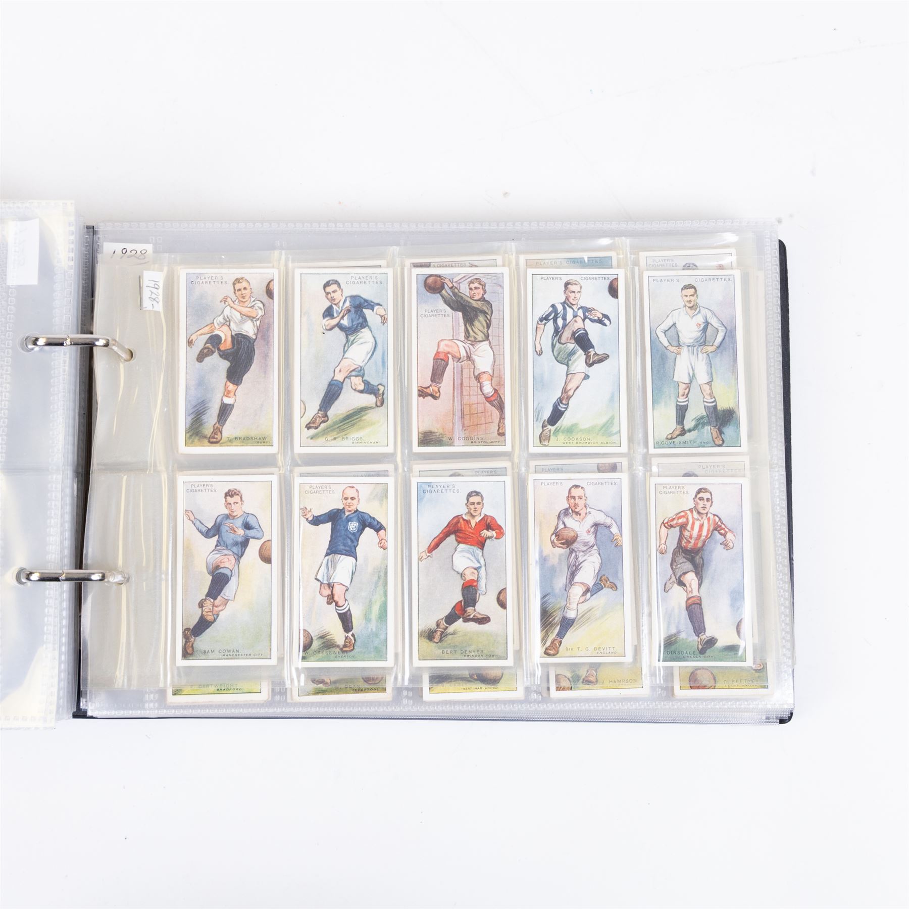 Collection of Edwardian and later Football related trading and cigarette cards, including forty-nine of fifty 1906 Ogden's Football Club Colours, 1922 PALS Footall series, ninety of one hundred 1925 Gallaher Famous Footballers, complete set of forty-four 1926 Ogden's Captains of Association Football Clubs and Colours, complete set of fifty 1927 Players Football Caricatures by MAC,  complete set of fifty 1927 Players Football Caricatures by RIP,  complete set of fifty 1930 Players Association Cup Winners, complete set of 50 1933 Ogdens AFC Nicknames etc, housed in brown cigarette card album