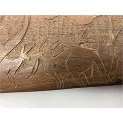 Australian Aboriginal shield, carved with Kangaroo and Emu, 74.5cm; Spear painted with aquatic creatures 78cm, and Spear thrower 81cm (3)