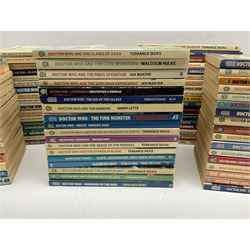 Approximately one hundred and seventeen Doctor Who paperback books published by Target, to include 'The Mind of Evil' no. 96, 'Doctor Who and the Androids of Tara' no.3, 'Doctor Who and the Face of Evil' no.25, including examples with blue spines and black/white target logo, colour target logo etc