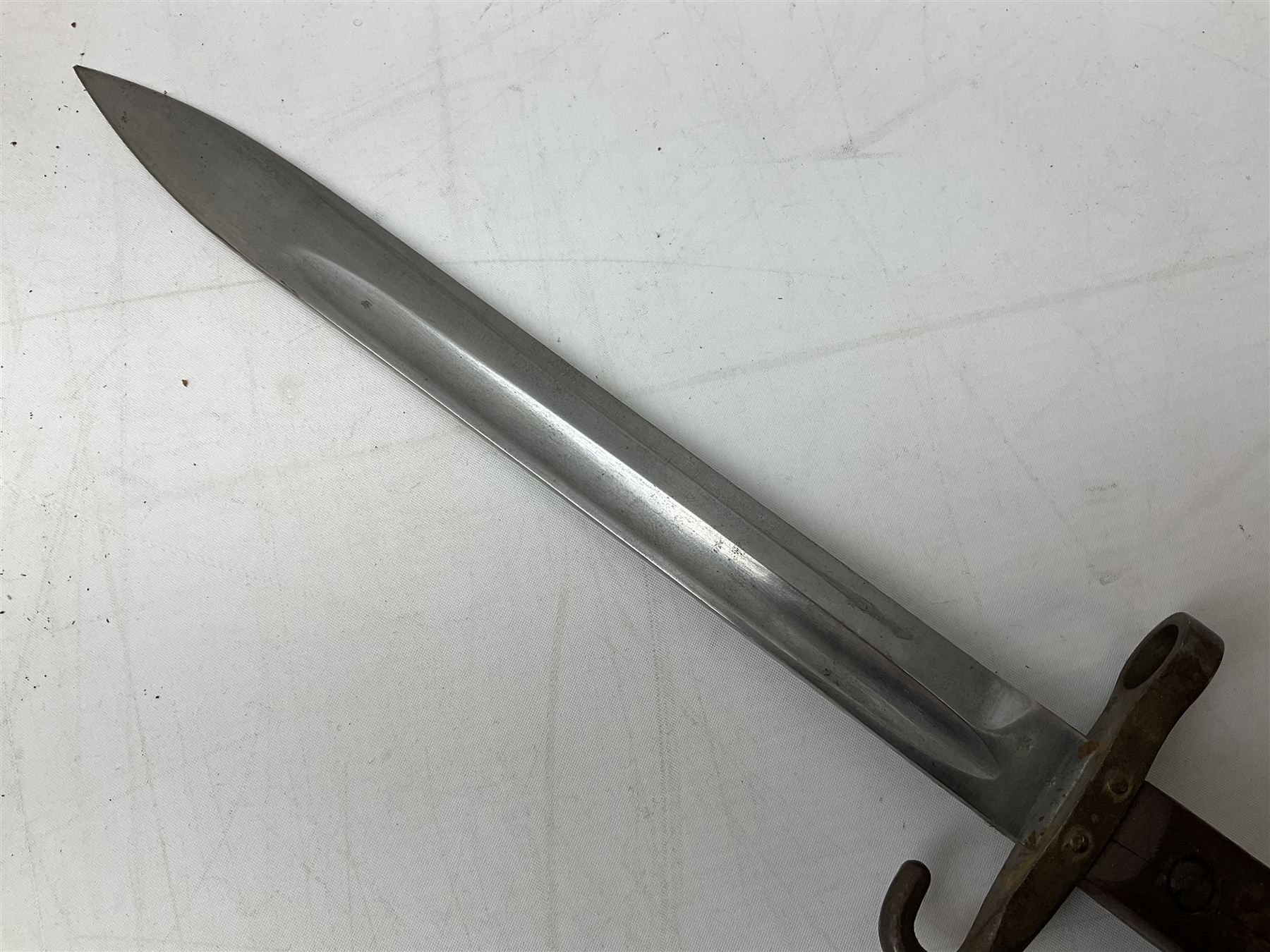 Austrian Model 1895 carbine NCO's knife bayonet with 25cm fullered steel blade; in steel scabbard with webbing frog L39cm overall; and Spanish Model 1941 Bolo bayonet with 25cm fullered steel blade No.6412D; in steel scabbard (2)