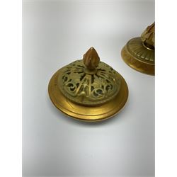 A Royal Worcester potpourri vase and cover, shape 1813, the bulbous body hand painted with pink roses and signed A Watkins, supporting a gilded and burnished pierced cover, upon a moulded stem with zoomorphic mask detail and circular foot, with puce printed mark beneath, H24cm