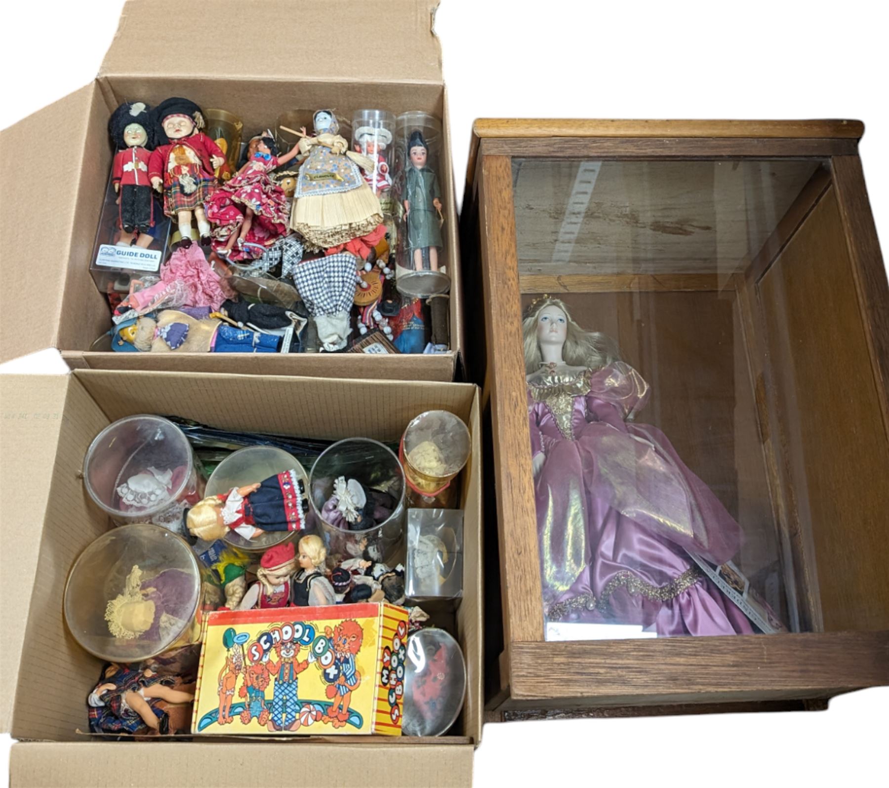 Franklin Heirloom doll, Cinderella, in wooden display case, together with a collection of 'Dolls of the World' and similar