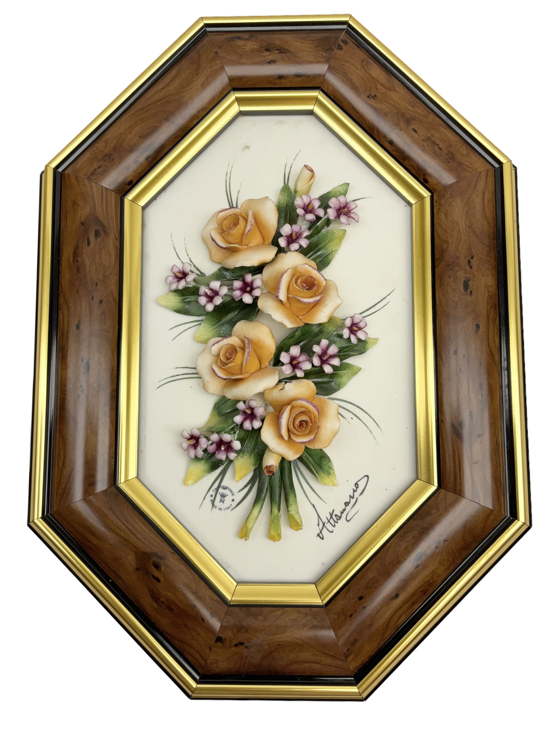 Set of three Capodimonte wall plaques, depicting floral decoration in octagonal frames with gilt edging, largest plaque H48, two small plaques H31cm.    