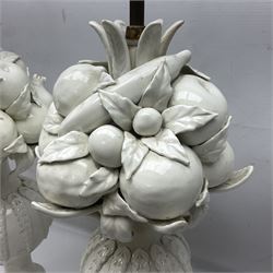 Pair of Casa Pupo white-glazed table lamps, modelled as a fruit upon a column of baluster form with foliate decoration, on a giltwood base, H62cm