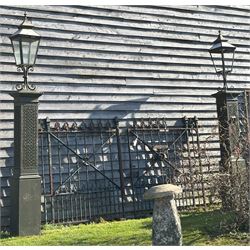 Impressive pair of 19th century cast iron gate piers by Coalbrookdale, each with a later lantern surmount on scrolled mount, above columns with blind fret strapwork decoration, on square section bases. Overall H350cm, Height excluding lanterns 220cm.  - COLLECTION BY APPOINTMENT FROM: The White House, Thirsk Road, Easingwold, York, YO61 3NF - CALL 01723 507111 TO ARRANGE