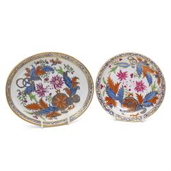New Hall part tea and coffee service richly decorated  with a Tobacco Leaf design in pattern 274 comprising nine tea cups, eight coffee cans, ten saucers, tea pot and stand, sucrier and cover, slop bowl, milk jug and plate, circa 1800