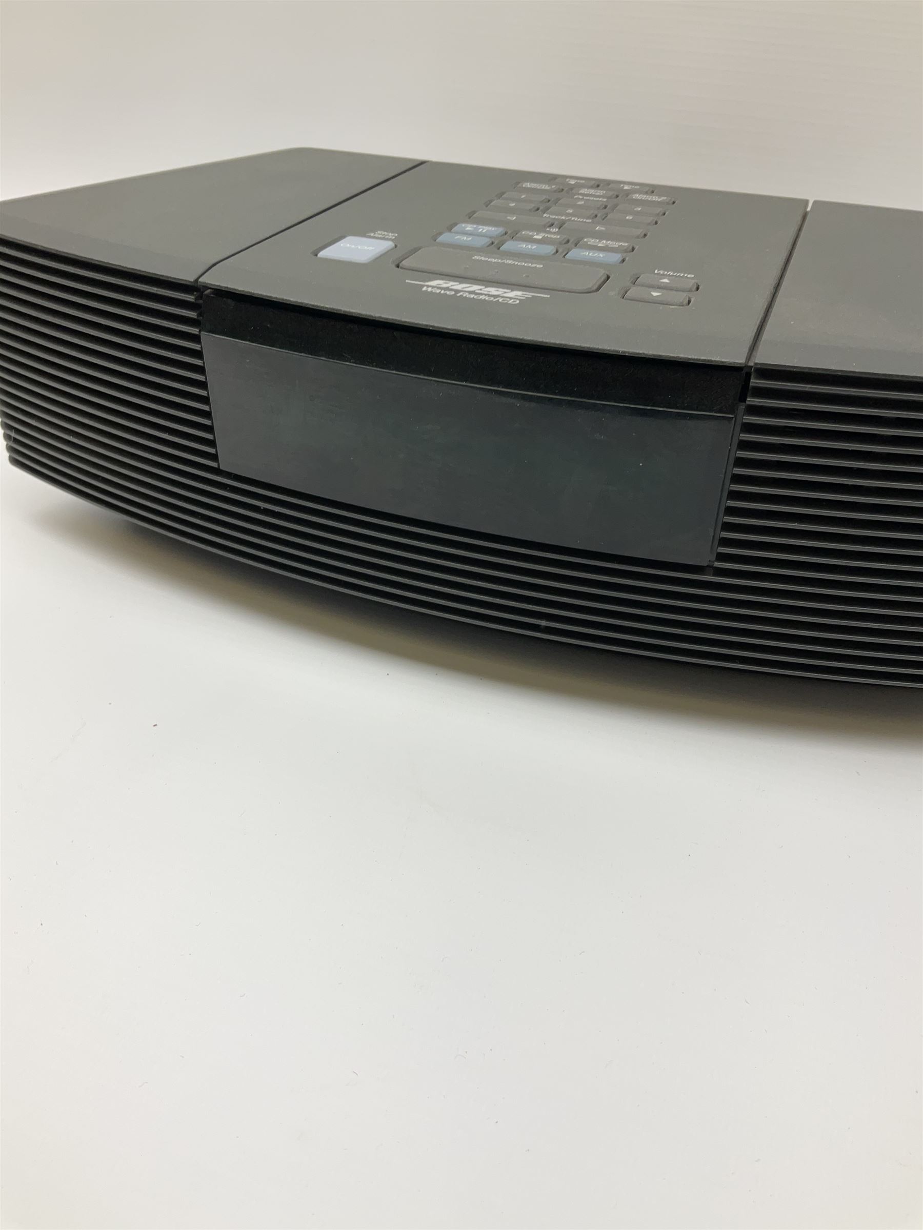 A Bose Wave radio and CD player, model no AWRC3G, with remote and instruction booklets 