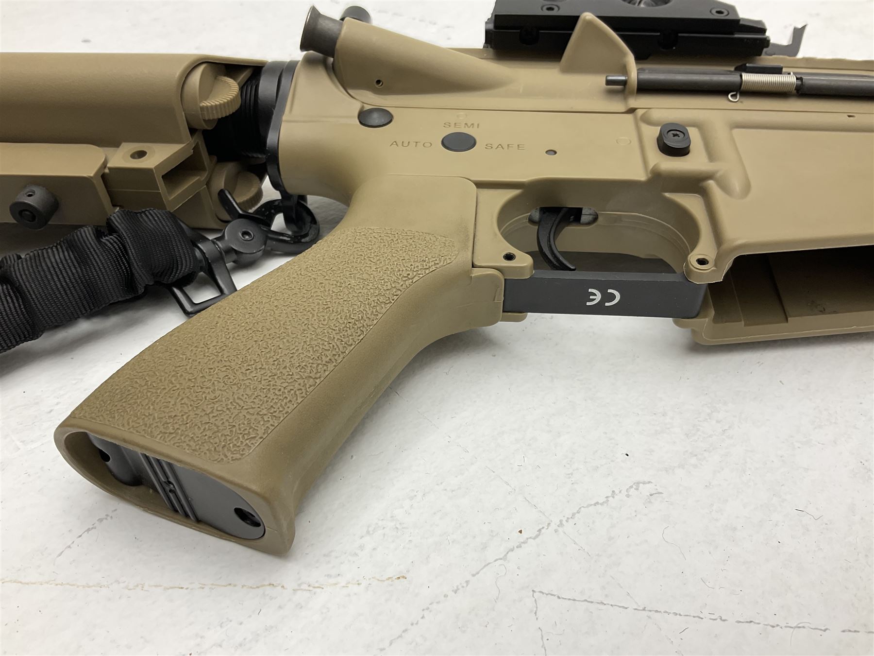 Combat Machine lithium battery powered airsoft BB rifle, 'Complete AEG Series' to fire 5mm pellets, with adjustable length stock L69cm non-extended; with six magazines, Trijicon ACOG red dot telescopic sight, battery charger etc (NO BATTERIES)