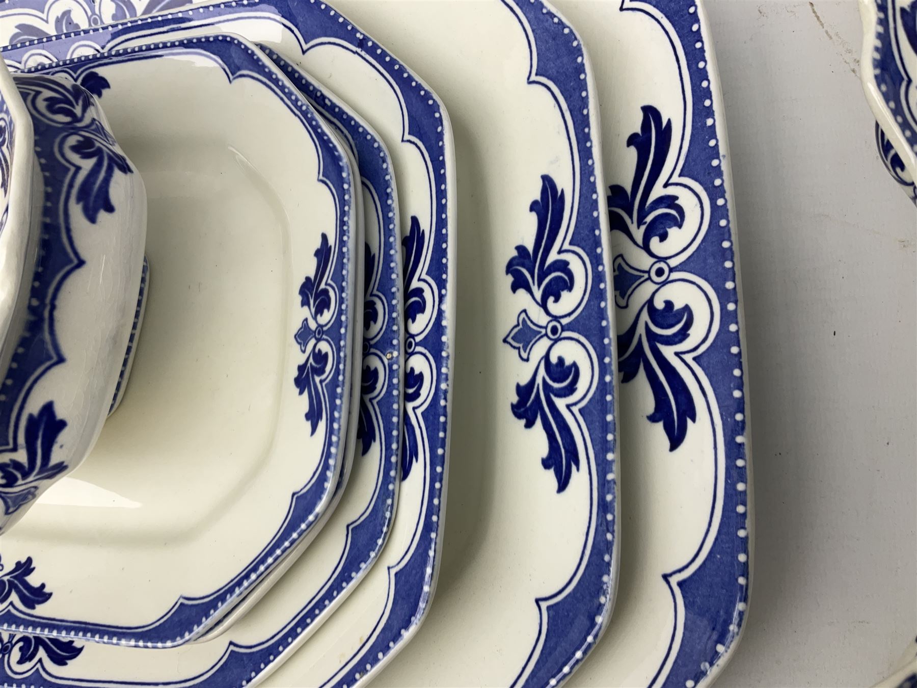 Burgess and Leigh Middleport pottery dinner wares decorated in the ‘Milford’ pattern, to include lidded tureens, graduated meat plates, dinner plates etc 