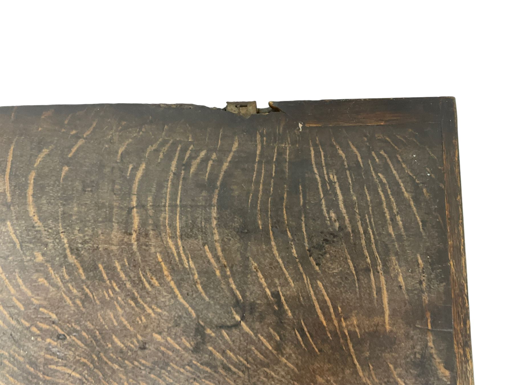 18th century oak sword chest or coffer, hinged lid with moulded edge and iron fittings concealing candle box and main compartment, the front with studwork spelling 'TC 1750', raised on bracket feet