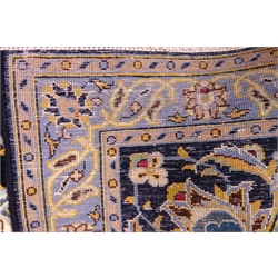  Kashan blue ground rug, central medallion, floral repeating border, 338cm x 250cm  
