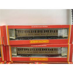 Hornby '00' gauge - six passenger coaches and nine goods wagons; two R902 and one R900 controllers; all boxed; Dublo level crossing; quantity of track; catalogues etc