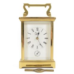 French-20th century carriage clock in an anglaise case with carrying handle, 8-day movemen...