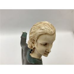 Art Deco style bronze, after Josef Lorenzl, modelled as a dancing lady with outstretched arms, with resin head and hands, raised upon marble effect base, signed to base, H38cm