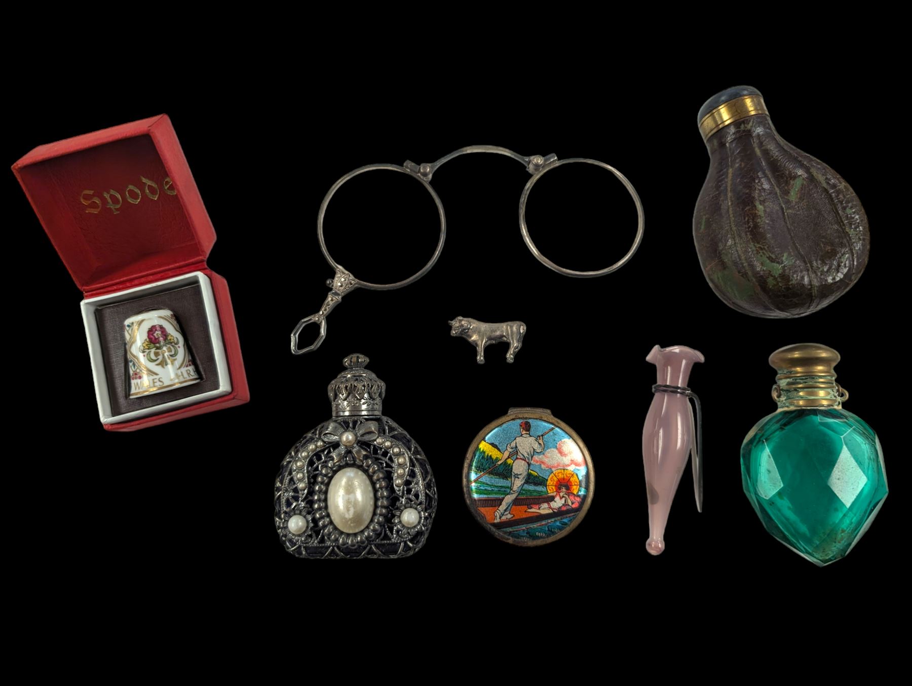 Faceted green glass scent bottle with brass cover, other scent bottles, pair of lorgnettes, Spode thimble, glass posy holder, etc 