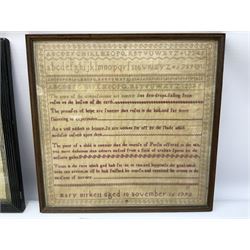 Late 18th century sampler worked with the alphabet above verses in red, by Mary Birkett aged 10 November 16th 1792, H33.5cm W34.5cm, together with another sampler worked with the alphabet above Proverbs 14:23, by Mary Anne Hainworth, Chesham, date unknown (--83), both in glazed frames, together with a quantity of Victorian and later dolls clothes to include lace examples