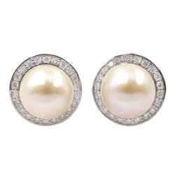 Pair of 9ct white gold pearl stud earrings, with detachable diamond channel set cradles