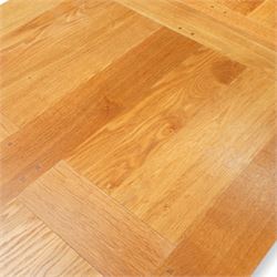 Light oak extending dining table, rectangular top with two additional leaves, on square chamfered supports united by H-stretchers