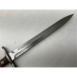 Schmidt-Rubin Model 1918 bayonet, the 30cm steel blade marked Elsener Schwyz, cross-piece numbered 813558; in steel scabbard with leather frog stamped E. Banga Sattler Selzac 67 L45.5cm overall; and Swiss Model 1957 SIG rifle bayonet by Wenger; in plastic scabbard with leather frog stamped E. Walty Sattlerei Baretswil 84 (2)